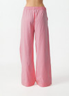 THE UPSIDE women’s pink Cortina Elita Pant is a mid-rise style with a soft elastic waistband, slanted side-seam pockets and cream piping. Made for lifestyle.