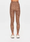 THE UPSIDE women's animal Panthera 25 Inch Midi Pant is designed for a mid-rise fit and features navy contrast binds down the side seams and a blue elastic drawcord. Made for yoga and pilates.