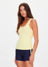 THE UPSIDE women's yellow organic cotton Del Rey Pointelle Tank Top features a scooped front and back neckline, and ruffle lace edge tonal trim. Made for lifestyle.