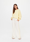 THE UPSIDE women's natural recycled polyester Roma Pant is high rise and features a butter mesh tape along side seams and back pockets with a logo pip. Made for lifestyle.