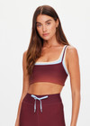 THE UPSIDE women's red recycled peached Maya Sal Double Layer Bra is mid coverage and features a scooped neckline, elasticated underbust and removable cups. Made for yoga and pilates.