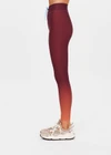 THE UPSIDE women's red Maya 25 Inch Legging is a mid-rise fit and features an elasticated drawcord in light blue with aglets. Made for yoga and pilates.