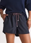 THE UPSIDE women's stripe Wool Iggy Short is a relaxed, mid-rise fit and features cream piping along side seams and maroon paracord drawcord. Made for lifestyle.