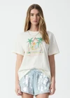 THE UPSIDE women's natural organic cotton Royal Palm Jodhi Tee is designed for a regular fit and features a royal palm graphic printed at front chest. Made for lifestyle.