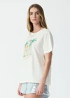 THE UPSIDE women's natural organic cotton Royal Palm Jodhi Tee is designed for a regular fit and features a royal palm graphic printed at front chest. Made for lifestyle.