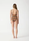 THE UPSIDE women's check Del Sol Flow One Piece is low coverage and features a high shaped legline and navy elastic adjustable straps. Made for swim.