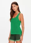 THE UPSIDE women's green organic cotton La Paz Riva Knit Tank is a basketball tank style featuring an open knit construction and a knitted palm tree detail on back. Made for lifestyle.