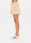 THE UPSIDE women's yellow Soho Dolci Short is designed for a high-rise, wide-leg silhouette with a elasticated waistband and front pockets, in soft brushed recycled cotton. Made for everyday leisure.