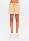 THE UPSIDE women's yellow Soho Dolci Short is designed for a high-rise, wide-leg silhouette with a elasticated waistband and front pockets, in soft brushed recycled cotton. Made for everyday leisure.