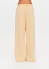 THE UPSIDE women's yellow Soho Tokio Wide Leg Pant is designed for a relaxed fit and features an elasticated waistband, front pockets and embroidered arrow logo. Made for everyday.