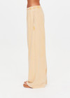 THE UPSIDE women's yellow Soho Tokio Wide Leg Pant is designed for a relaxed fit and features an elasticated waistband, front pockets and embroidered arrow logo. Made for everyday.