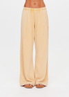 THE UPSIDE women's yellow Soho Tokio Wide Leg Pant is designed for a relaxed fit and features an elasticated waistband, front pockets and embroidered arrow logo. Made for everyday.