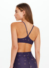 THE UPSIDE women's navy horseshoe print Cheval Zoe Sports Bra is made from recycled, super soft and breathable quick-drying fabric and feature adjustable straps.