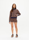 THE UPSIDE women's beige and navy geometric print Crossroad Margot Knit slim fit Jacket is made with an organic cotton jacquard and feature front welt pockets.