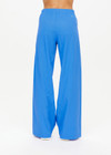 THE UPSIDE women's bright blue Juliet Low Waist Trackpant is made from a slinky, lightweight fabric and feature side stripes, pockets and a split flared hem.
