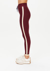 THE UPSIDE women's maroon Trail 25 inch Legging is made from soft, breathable fabric and features a mid-rise waistband with an elasticated drawcord.