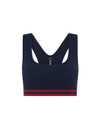 THE UPSIDE women's navy Seamless Jade Racerback Sports Bra is made from soft organic cotton fabric and features a scoop neckline and removable bust cups.