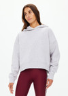 THE UPSIDE women's grey marle Byron Embossed Logo Hoodie is made from an organic cotton with a relaxed boxy shape featuring a tonal embossed horseshoe logo at the front.