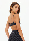 THE UPSIDE women's jacquard pinstripe Zenith Ballet Bra features is a low coverage sports bra with soft support and elastic adjustable straps. Perfect for pilates & yoga.