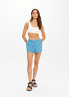 THE UPSIDE women's blue stripe Rio Billie Short features a soft terry fabrication with elasticated waistband and side seam pockets. The perfect vacation piece.