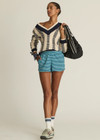 THE UPSIDE women's cream and navy check Sonny V Neck Sweater is a classic V neck knit in organic cotton. The perfect wardrobe addition.