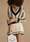 THE UPSIDE women's cream and navy check Sonny V Neck Sweater is a classic V neck knit in organic cotton. The perfect wardrobe addition.