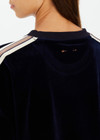 THE UPSIDE women's navy Monaco Lisel Crew Neck Sweater is a soft recycled velour fabric in a relaxed fit with a dropped shoulder. The perfect travel or everyday piece.
