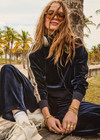 THE UPSIDE women's navy Monaco Lisel Crew Neck Sweater is a soft recycled velour fabric in a relaxed fit with a dropped shoulder. The perfect travel or everyday piece.THE UPSIDE women's navy Monaco Lisel Crew Neck Sweater is a soft recycled velour fabric in a relaxed fit with a dropped shoulder. The perfect travel or everyday piece.
