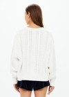 THE UPSIDE women’s off white Espada Talia cable knit sweater is made in a relaxed fit from chunky organic cotton and features a crew neck and ribbed neckline, cuff and hem.