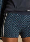 THE UPSIDE women's blue organic cotton Lumiere 3 Inch Knit Short is a mid rise comfortable fit and features a soft elasticated waistband in a geometric star design. Made for lifestyle.