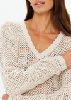 THE UPSIDE women's creme organic cotton Josephine V Neck Knit is a lightweight open knit designed for a relaxed fit with a deep V neckline. Made for everyday.