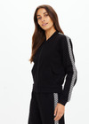 THE UPSIDE women's black Moto Kasia Zip Through Jacket is a soft suiting lenzing fabrication with welt pockets. The ideal travel jacket.
