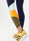 THE UPSIDE women's navy recycled peached Starburst 25in Legging is designed for a supportive fit and features a drawcord waist. Made for yoga and pilates.