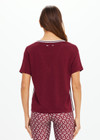 THE UPSIDE women's merlot Sienna V Neck Tee is a retro style slim fit track tee in a lightweight knit and features a deep V neckline. Made for everyday.