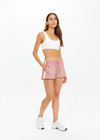 THE UPSIDE women's pink Galaxia Marcella Short is designed for a mid to low rise fit and features elasticated waistband and drawcord with side seam pockets. Made for lifestyle.