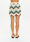 THE UPSIDE women's green organic cotton Tidal Hali Crochet Skirt features a knitted drawcord through waist. The perfect piece for vacation.