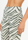 THE UPSIDE women's green Reversible 25inch Legging is designed for a soft & supportive fit in a recycled fabric and features embroidered arrow logo on back. Made for yoga & pilates.