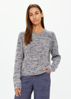 THE UPSIDE women's blue marle organic cotton linen Armada Skylar V Neck Sweater is a relaxed fit and features a V neckline and ribbed cuffs. Made for everyday leisure.