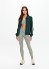 THE UPSIDE women's green Cobra Pari Zip Jacket is a true-to-size fit in a soft fabrication and features knitted stripes down sleeves. Made for everyday leisure.