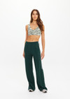 THE UPSIDE women's green Cobra Zephyr Wide Leg Pant comes in a soft fabrication with an elasticated waistband and welt pockets. Made for everyday leisure.