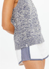 THE UPSIDE women's blue marle organic cotton linen Armada Koby Knitted Tank Top is true-to-size and features a high neckline with a subtle racer back detail. Made for lifestyle.