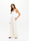 THE UPSIDE women's cream pinstripe Orion Mira Wide Leg Pant is a true-to-size fit and features a flat waistband with belt loops and side pockets. The perfect wardrobe essential.