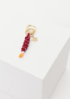 THE UPSIDE women's burgundy Limitless Keyring charm with gold metal star and macrame paracord in deep red with rubber dipped ends.