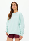THE UPSIDE women's mint organic cotton Stardust Saturn Crew is designed for a oversized fit and features an embroidered The Upside logo at front with subtle rhinestone detailing.