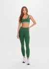 THE UPSIDE women's green Il Pelicano 25 inch Midi Pant is made from recycled rib. The high rise legging features soft folded waistband. Designed for yoga and exercise.