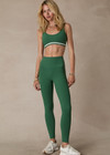 THE UPSIDE women's green Il Pelicano 25 inch Midi Pant is made from recycled rib. The high rise legging features soft folded waistband. Designed for yoga and exercise.
