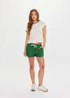 THE UPSIDE women's green Tennis in Bahamas Run Short is a mid rise short with a drawstring. Designed for running and exercise.