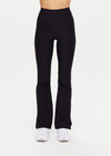 THE UPSIDE women's black Peached Florence Flare is a high-rise full length flare pant with V waistband and a printed arrow logo on back waistband.