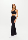 THE UPSIDE women's black Peached Florence Flare is a high-rise full length flare pant with V waistband and a printed arrow logo on back waistband.