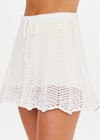 THE UPSIDE women’s cream Agni Elysia Knit Skirt is designed for a regular fit and features a chevron knit design and an elasticated waistband with drawcord. The perfect vacation piece.